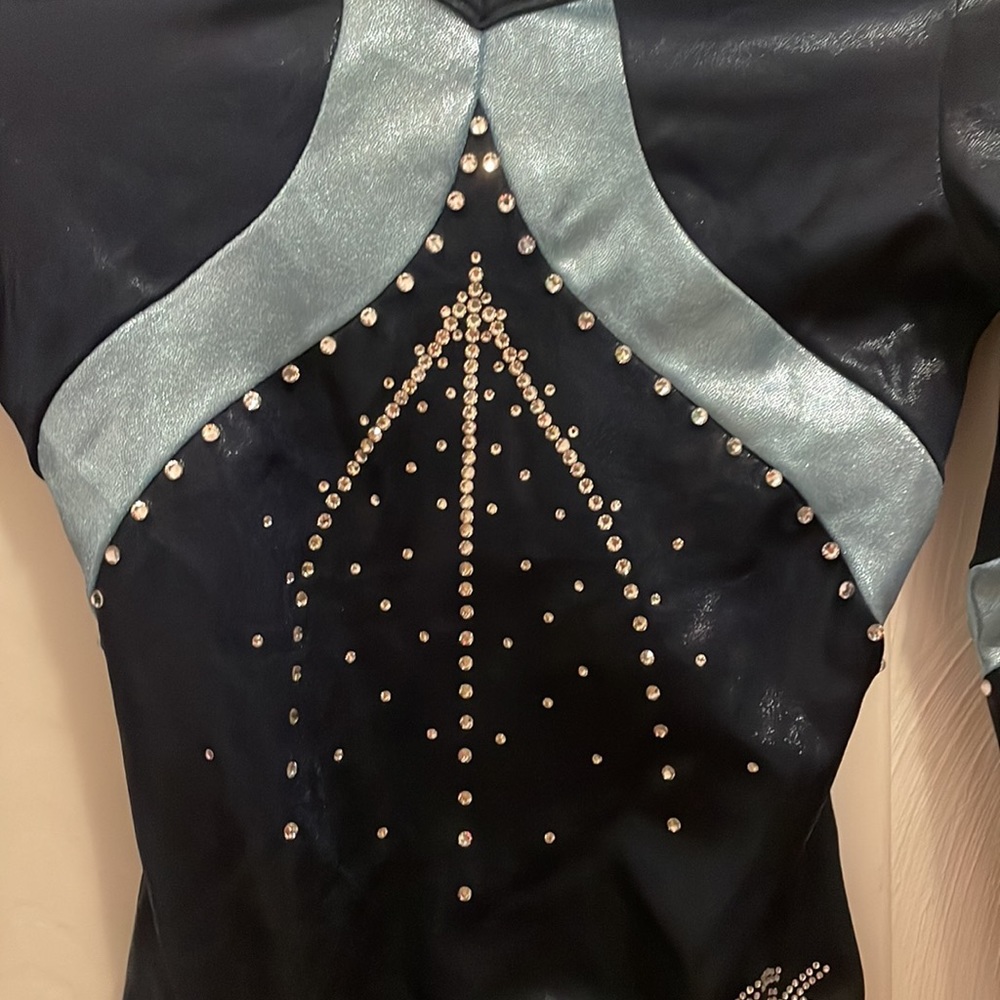 Navy blue gymnastics competition leotard.